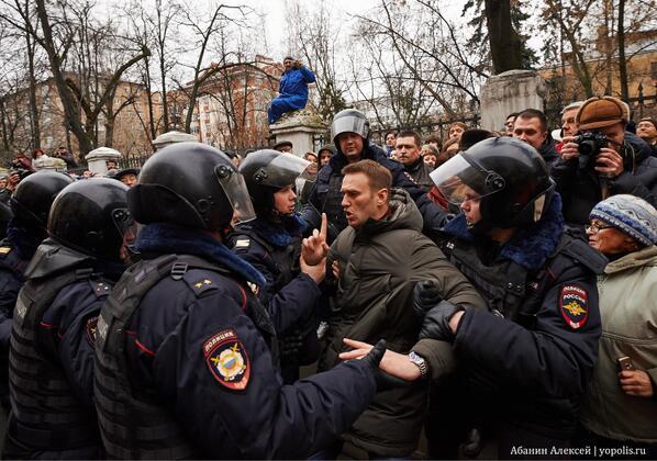 Navalny arrested in front of the court house February 2014 during the trial of the Bolotnaya defendants.