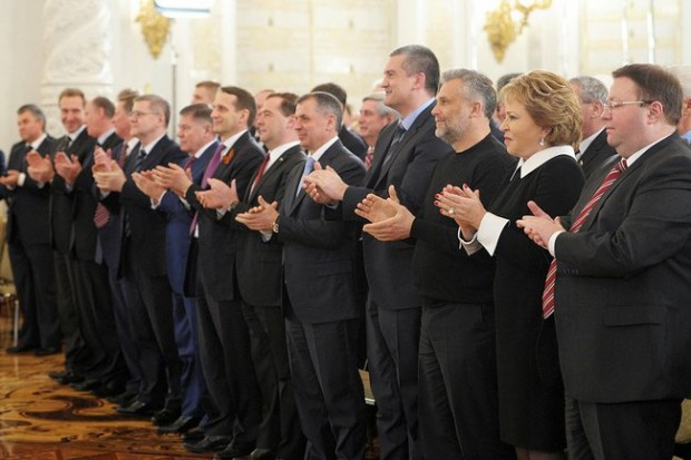 Kremlin officials applaud Putin 18 March 2014. Photo by kremlin.ru