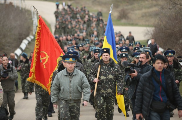 The Ukrainian commander at the head of a column of troops marching to Belbek airbase (Sean Gallup/Getty Images)