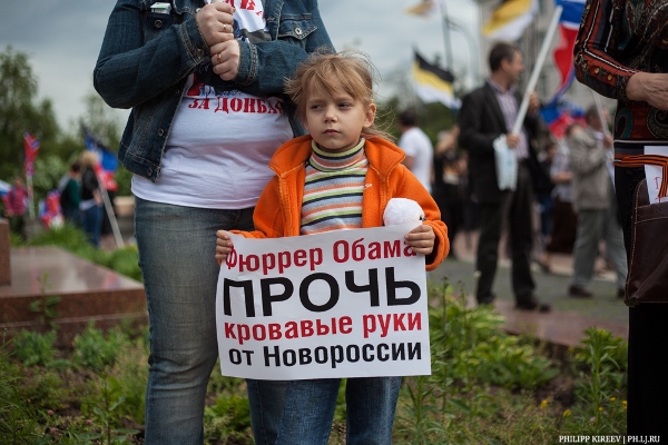 Child at demonstration in Moscow 11 June 2014. Photo by Philip Kikeyev via ridus.ru