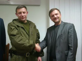 (L-R ) The leader of the DNR terrorists Aleksandr Zakharchenko and Mateusz Piskorski, 1 November 2014, Donetsk