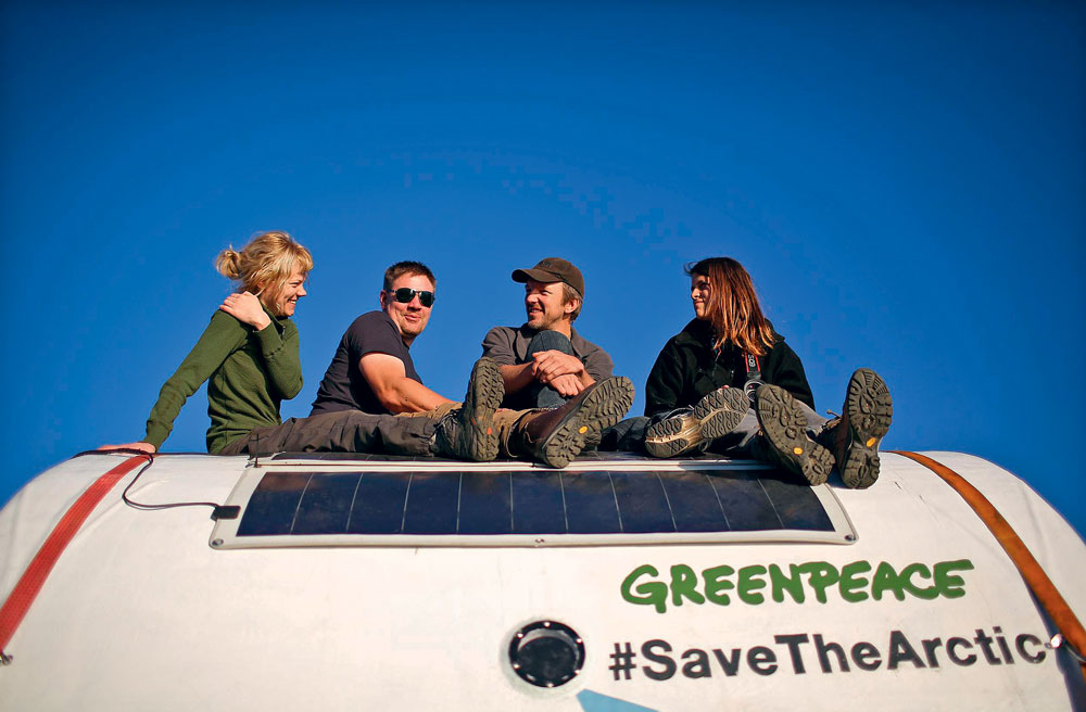 Sini Saarela, Anthony Perrett, Philip Ball and Camila Speziale (L to R) on the capsule which they planned to fasten to the Prirazlomnaya. Greenpeace activists were supposed to live inside the capsule.