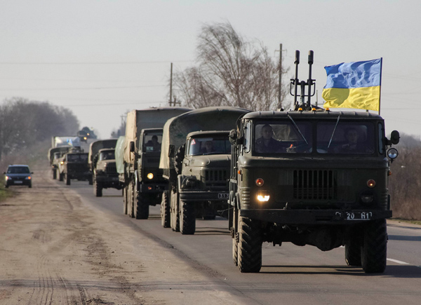 A military convoy with Ukrainian soldiers is seen near the city of Pervomaysk yesterday | Reuters