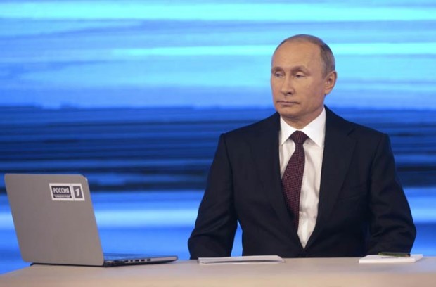 President Putin taking callers' questions on TV. Photo by Alexei Nikolski/RIA Novosti