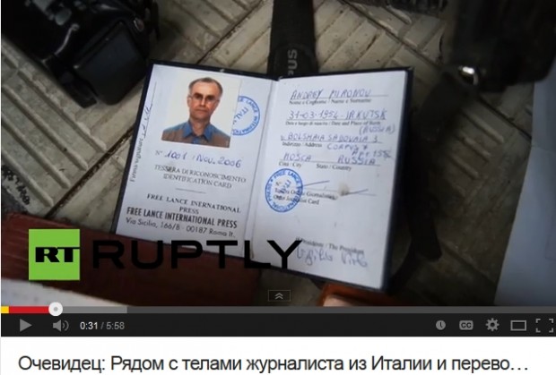 Press pass of Andrei Mironov displayed by Russian separatists at the morgue in Slavyansk. Screenshot from Ruptly video.