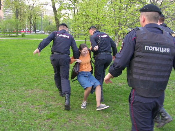 Police detain a Russian Orthodox activist who screamed at gay demonstrators. Photo by Andrei Nasonov