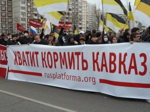 Banner: "Stop Feeding the Caucasus". Russian March in 2011. Photo by VOA.