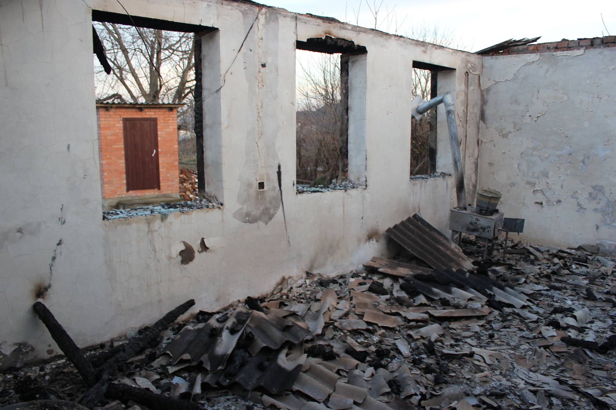 Burnt-Home-of-Relative-in-Chechnya1.jpg