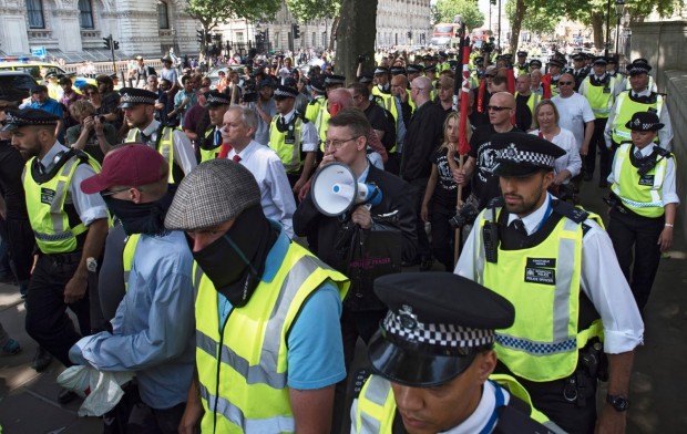 Jeremy "Jez" Bedford-Turner with a loud-speaker, followed by the activists from the National Revival of Poland, 4 July 2015, London. Photo: Jack Taylor/AFP/Getty Images
